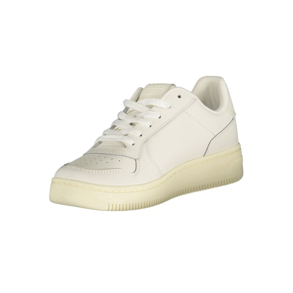 White sneaker with tan sole, laces, and trim