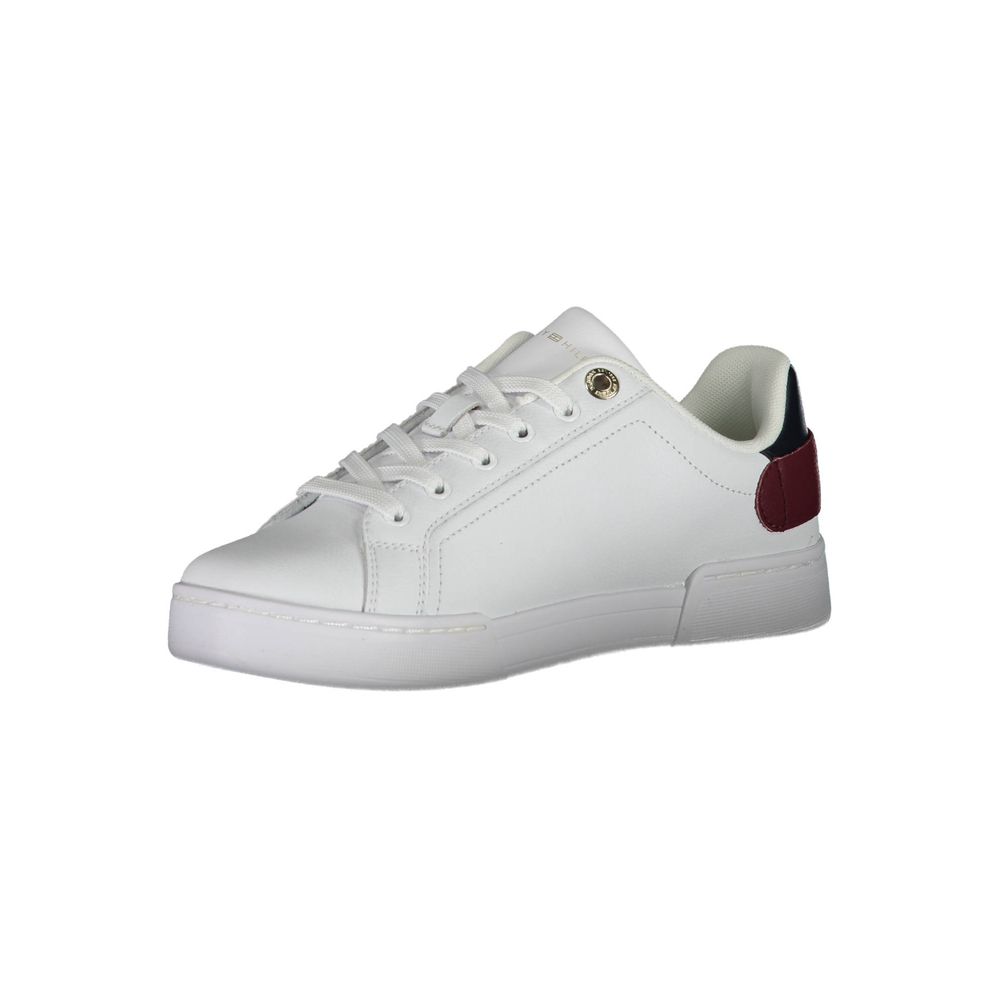 White sneaker with red accents, laces, and logo