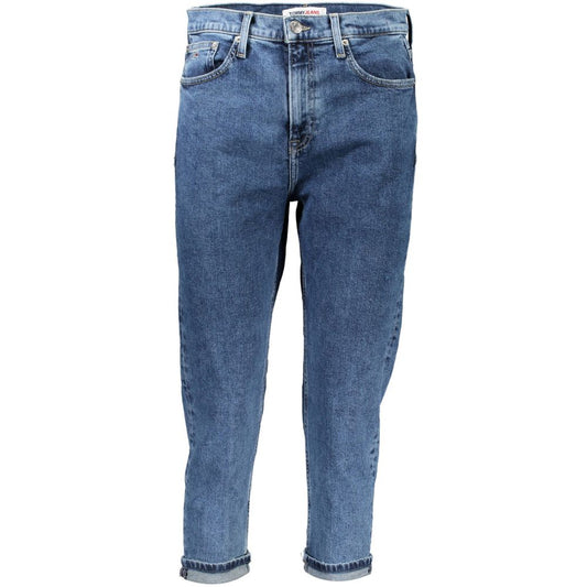 Pair of blue denim jeans with faded areas and rolled up cuffs