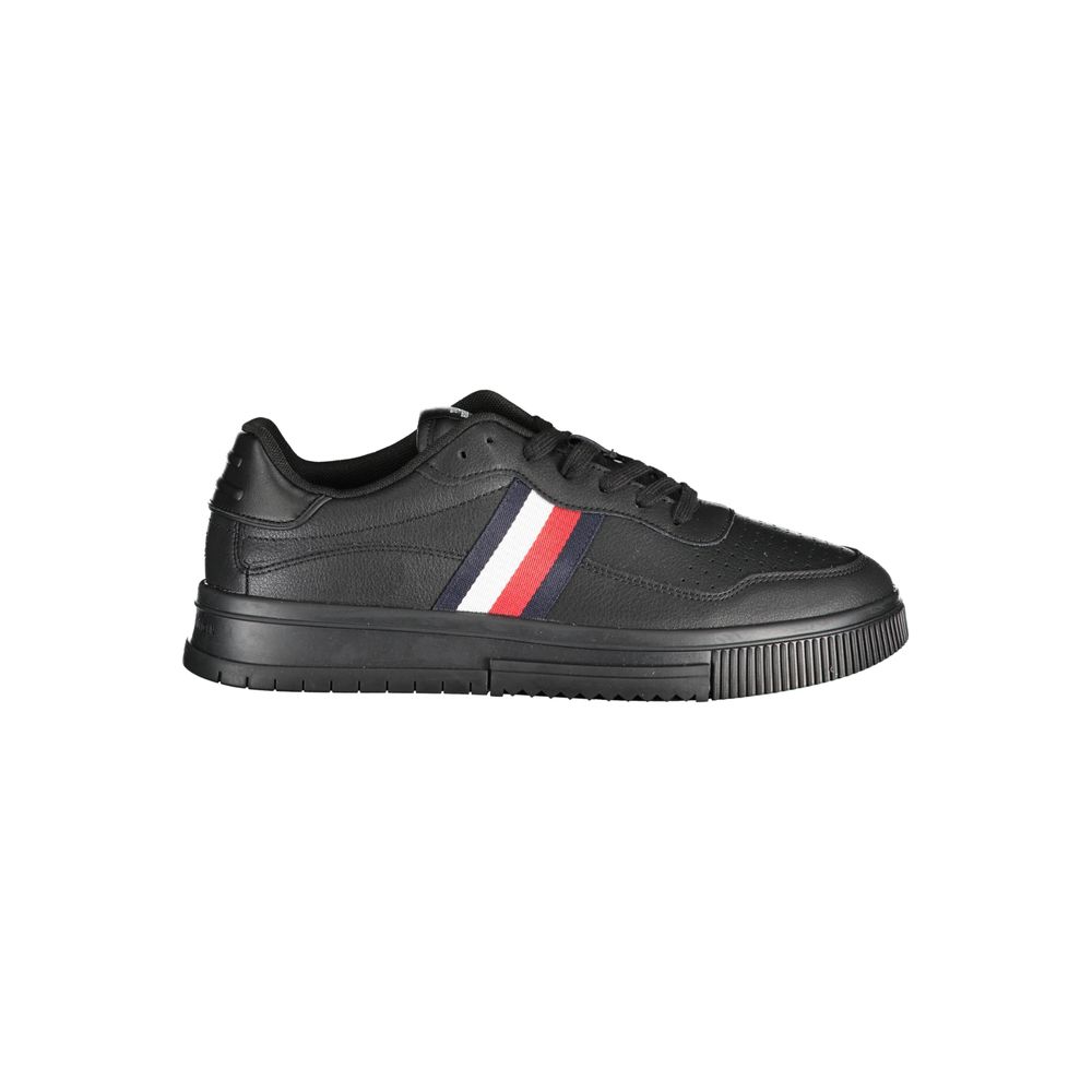 Black sneaker with white stripe and red accent on side