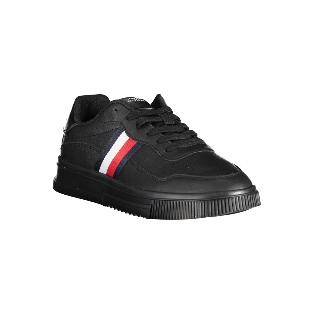 Black sneaker with white stripe and red accent on side