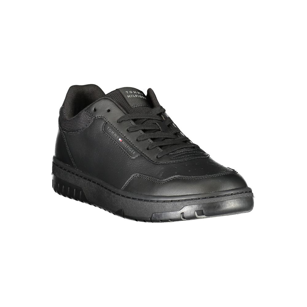 Black shoe with laces and a rubber sole