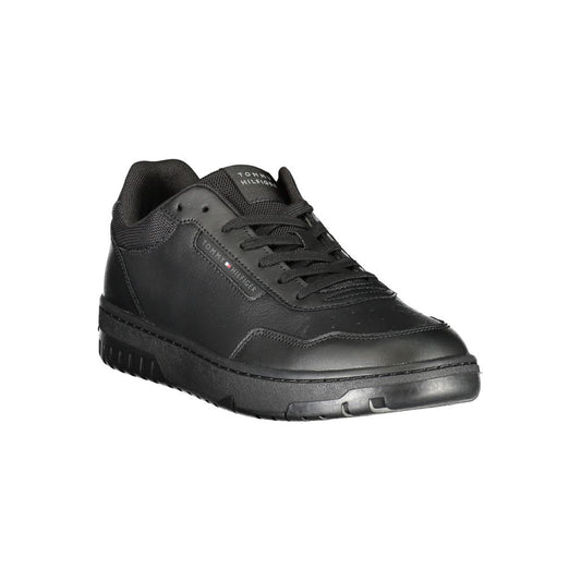 Black shoe with laces and a rubber sole