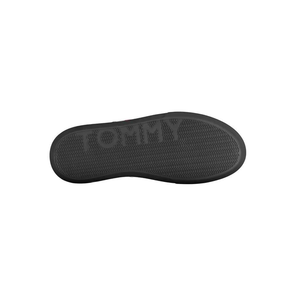 Black shoe with white logo on side