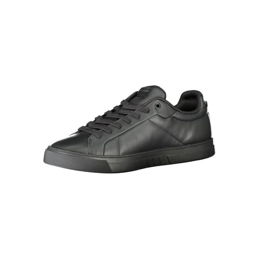A black leather men's sneaker with a white sole, laces, and logo