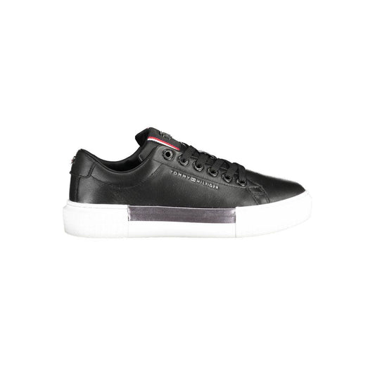 Black sneaker with white sole and red stripe on side