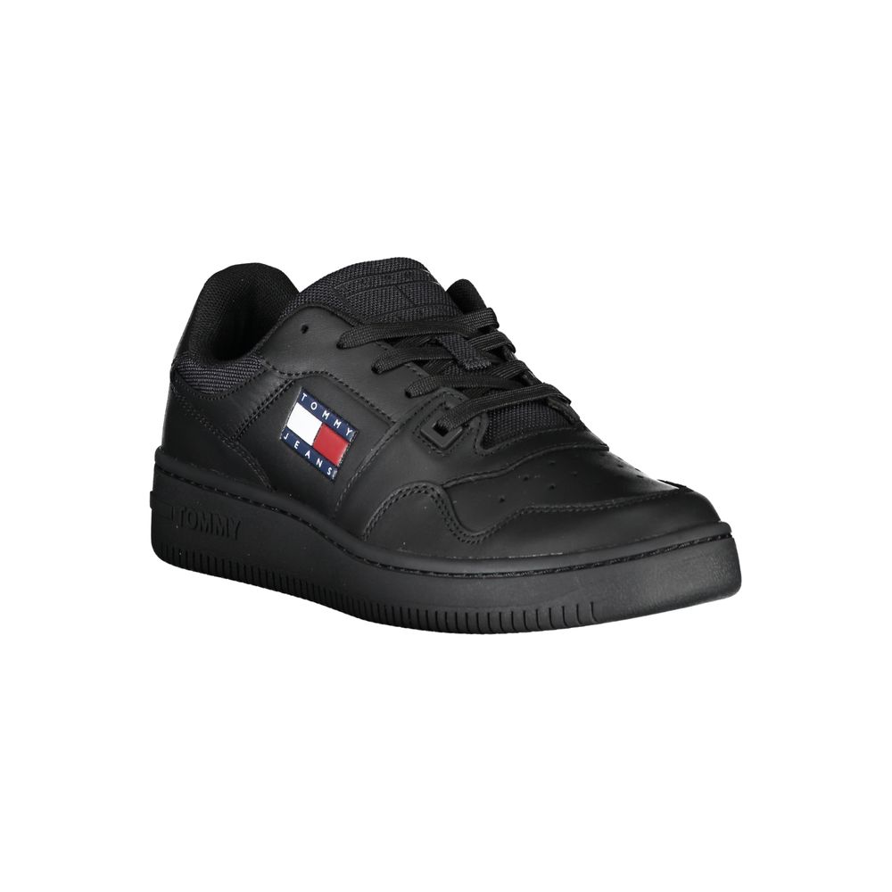 A black leather women's sneaker with a red, white, and blue logo on the side
