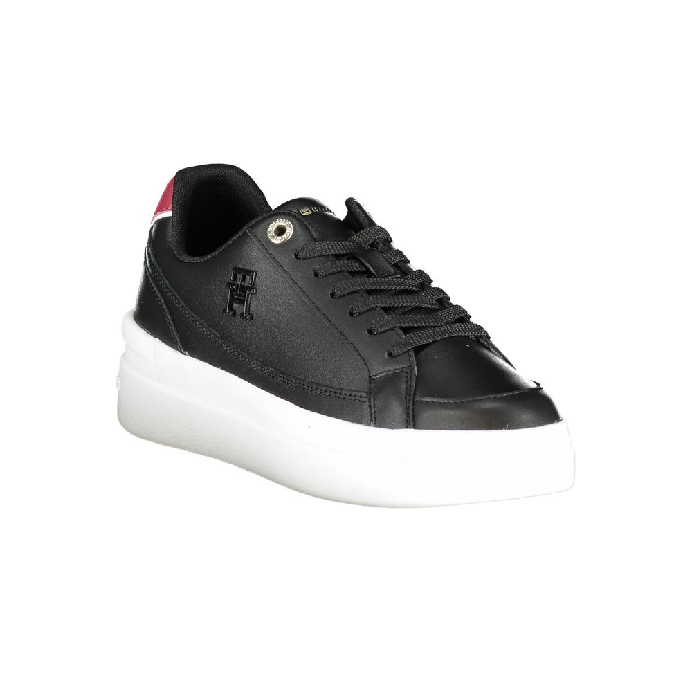 Black and white sneaker with red logo on side