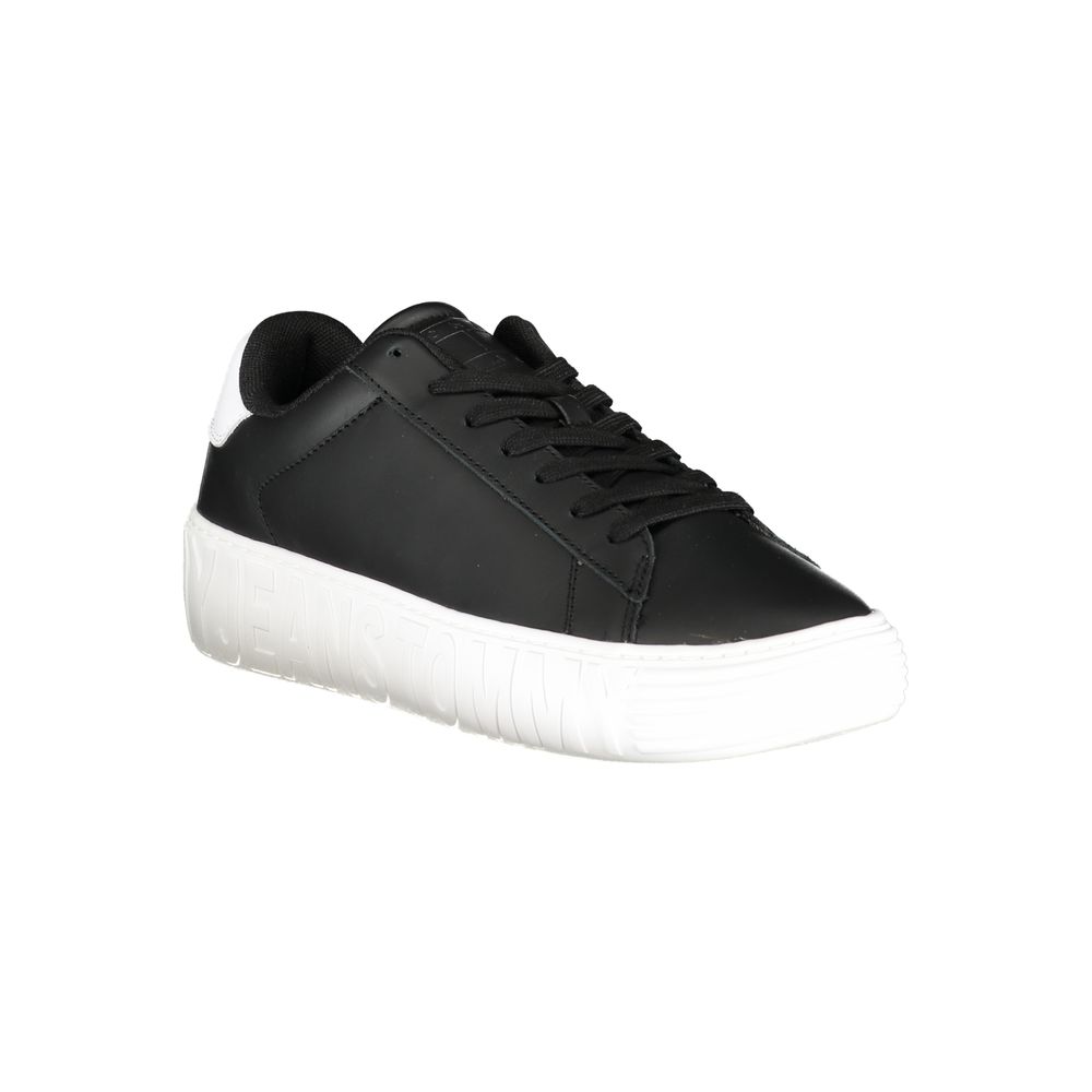 A black and white sneaker with a textured sole