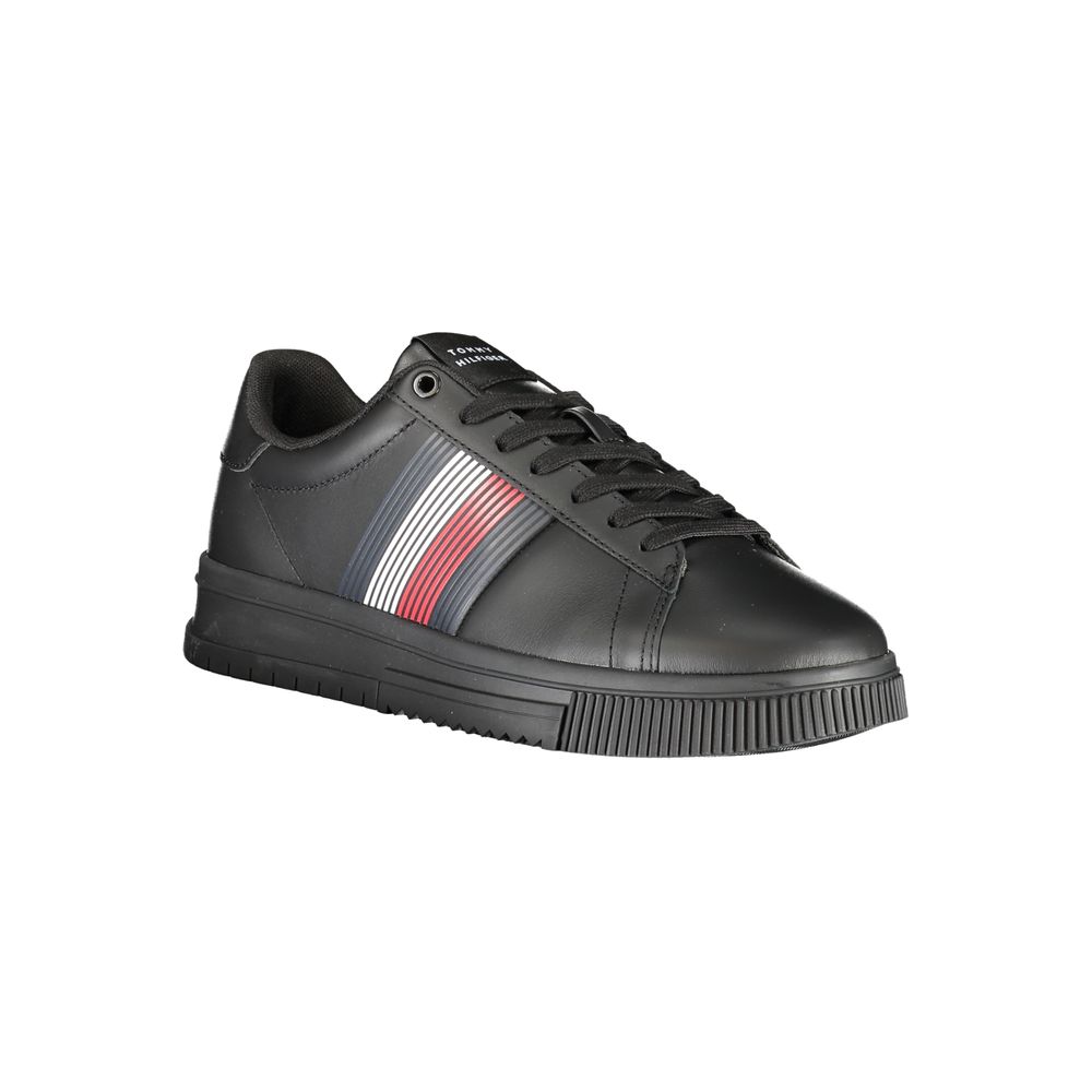 Black sneaker with white stripe and red accents