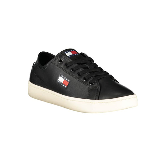 A black women's sneaker with a white sole, featuring a red and blue logo on the side