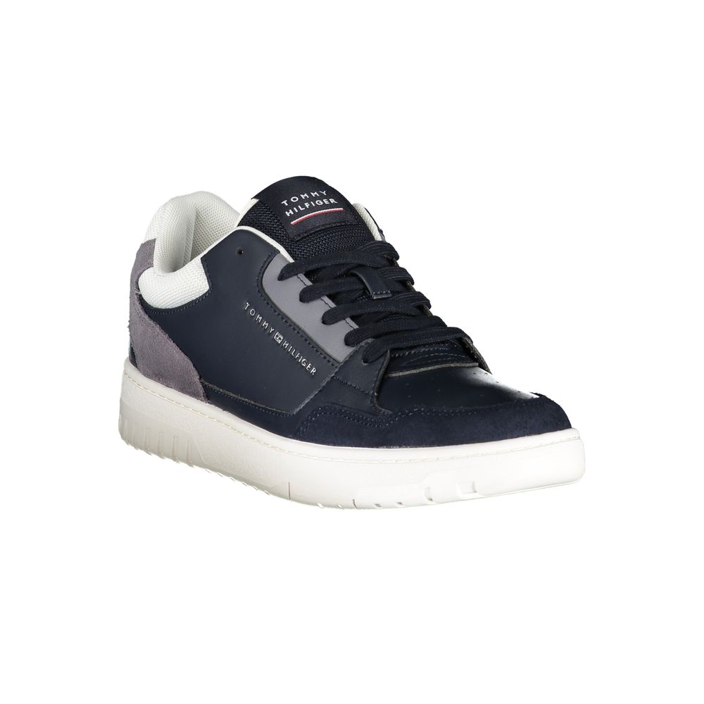 A blue men's sneaker with white sole, featuring a logo on the side and tongue