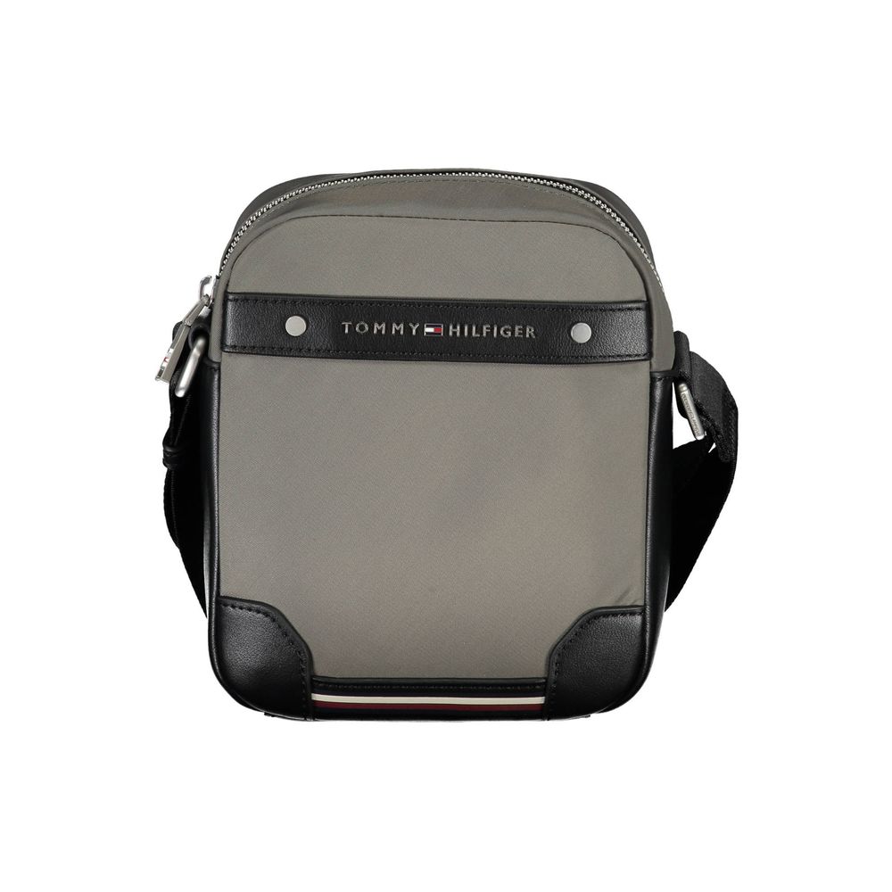 Grey and black fanny pack with brand name on front