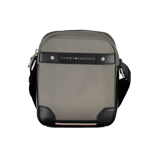 Grey and black fanny pack with brand name on front