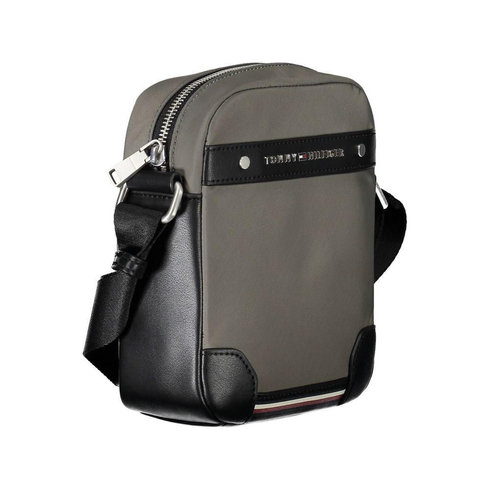 Grey and black backpack with zippered compartments and adjustable straps