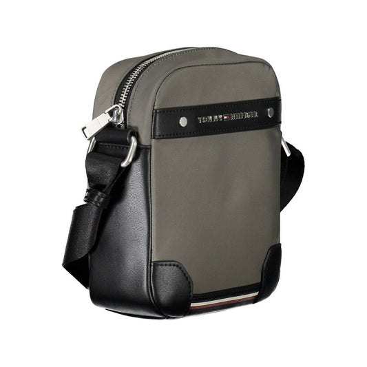 Grey and black backpack with zippered compartments and adjustable straps