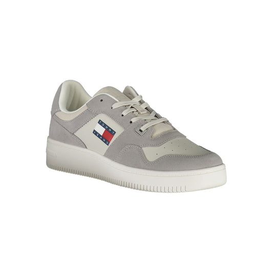 Grey men's sneaker with white sole, laces, and logo on side