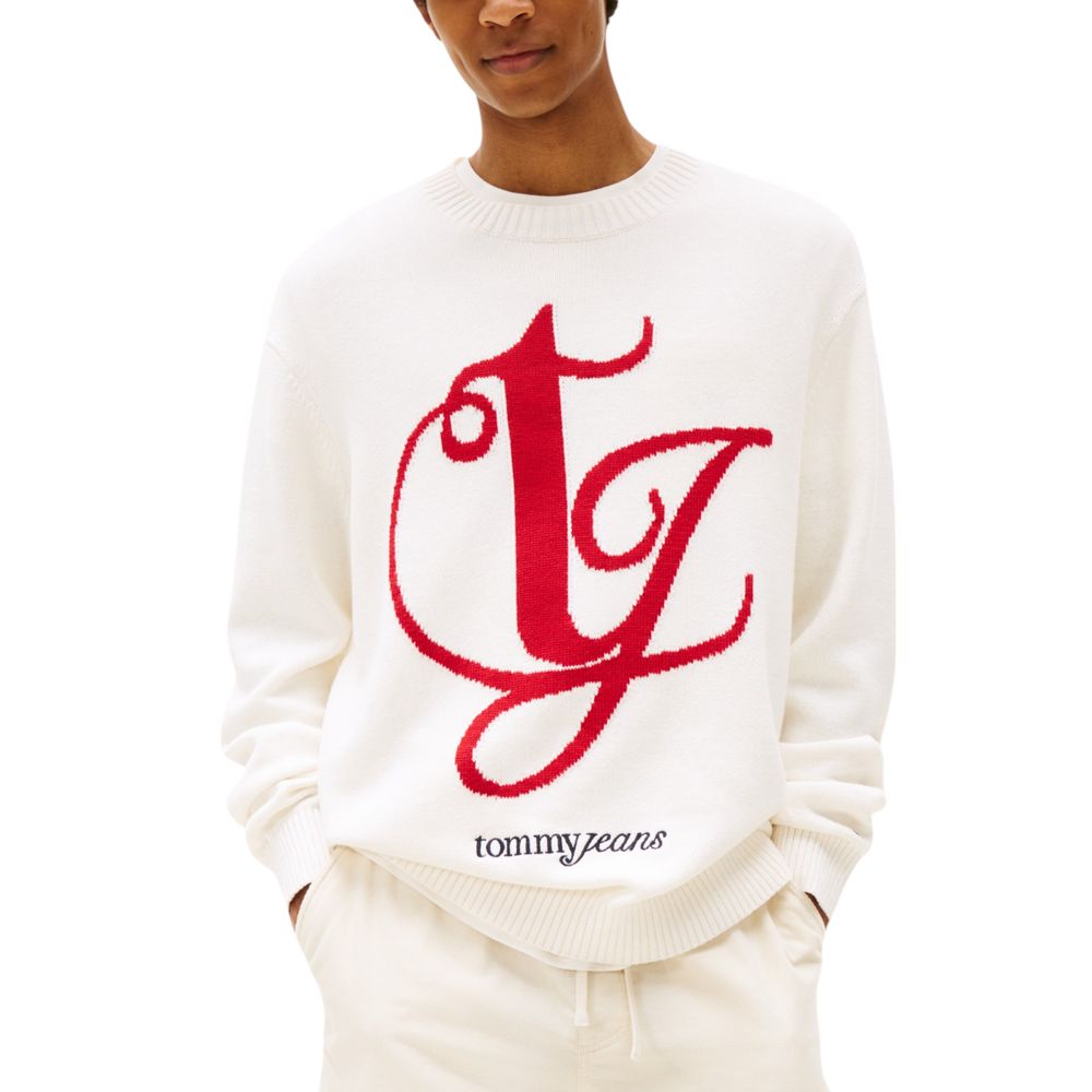 White sweater with red letters spelling "TYLER"