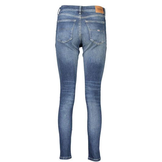 Pair of blue denim jeans with a brown leather patch on the back