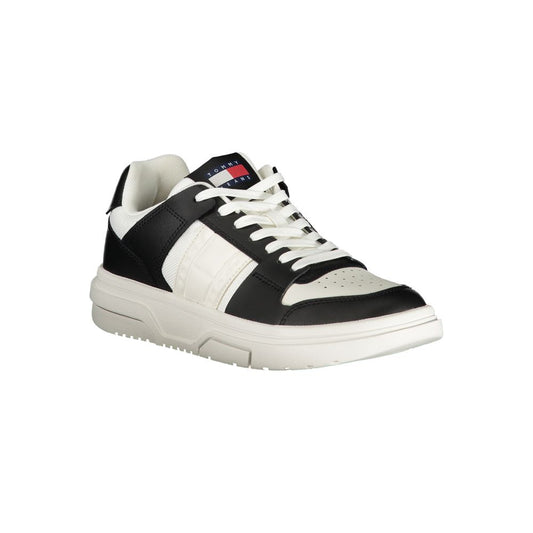 Black and white women's sneaker with laces, featuring a leather upper and a rubber sole