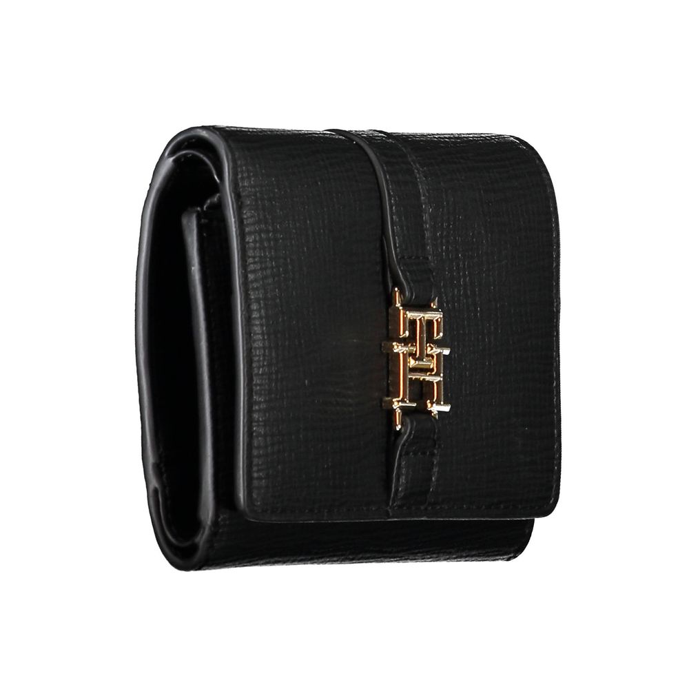Black leather belt with gold buckle