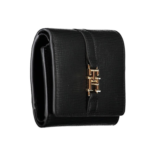 Black leather belt with gold buckle