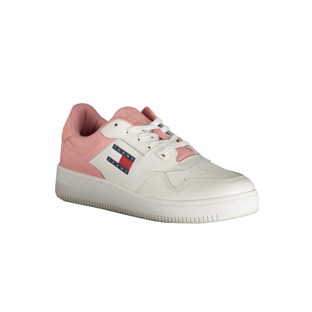 Pink and white sneaker with laces and logo on side