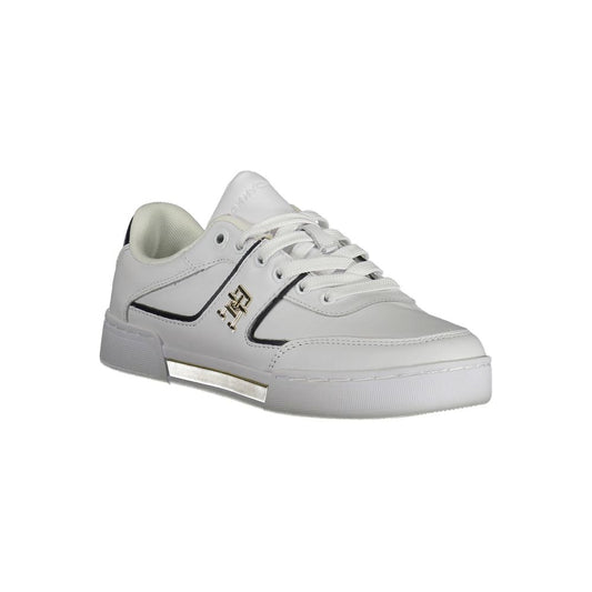 White sneaker with gold accents and a logo on the side