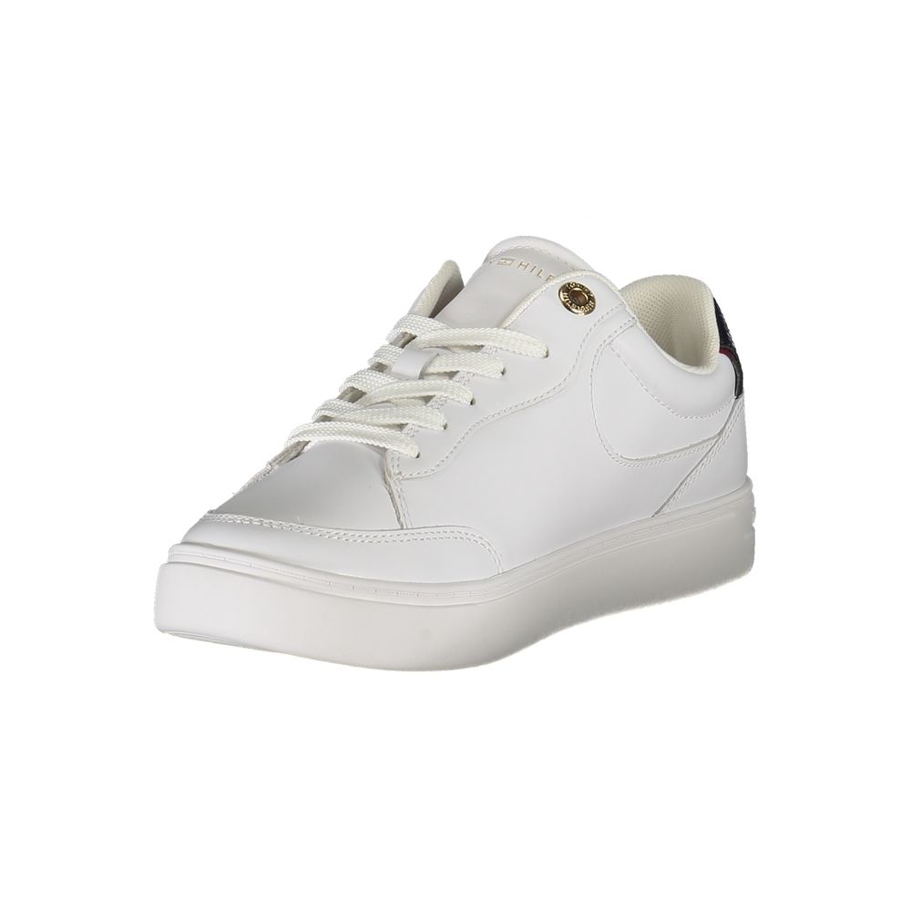 A white leather women's sneaker with a gold buckle, laces, and logo on the side
