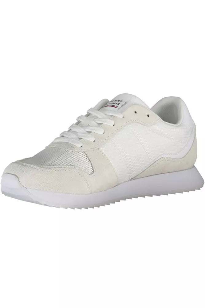 White sneakers with black laces and a logo on the side