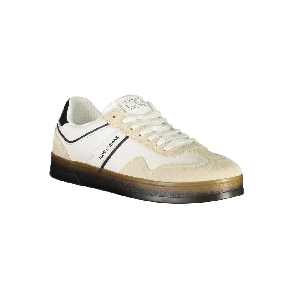 A white men's sneaker with black laces and a black sole, featuring the Tommy Hilfiger logo