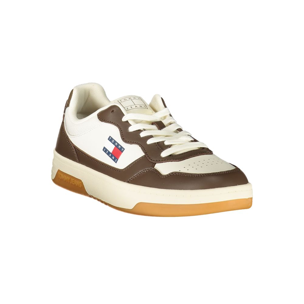 Brown and white men's sneaker with laces, logo on side, and rubber sole