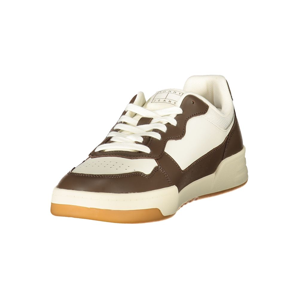 A white and brown men's sneaker with a lace-up front, featuring a textured toe cap