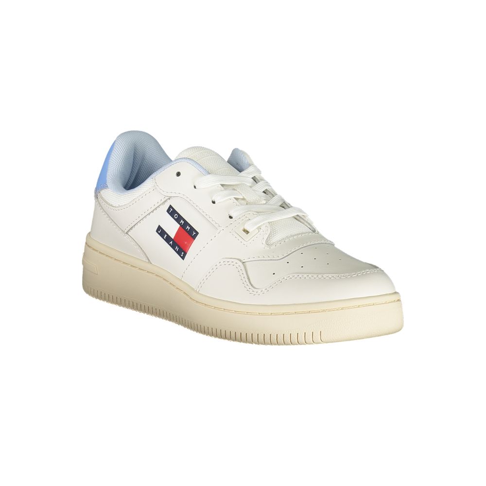 White sneaker with blue laces and red logo on side