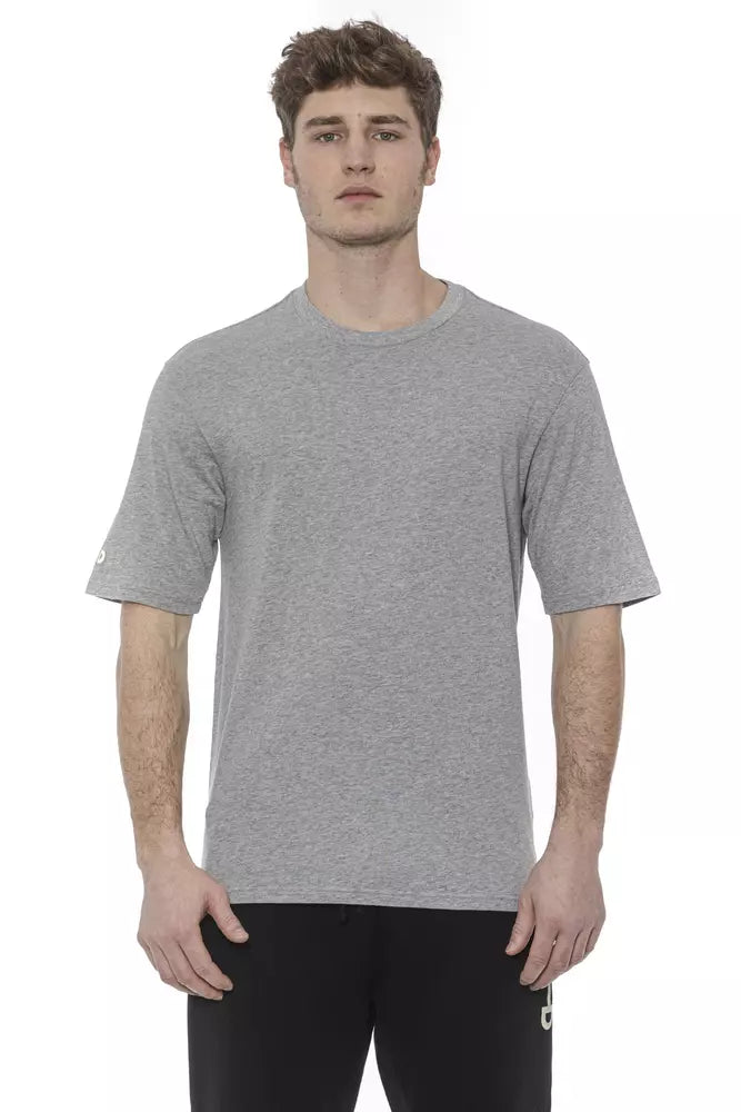 A man wearing a gray t-shirt