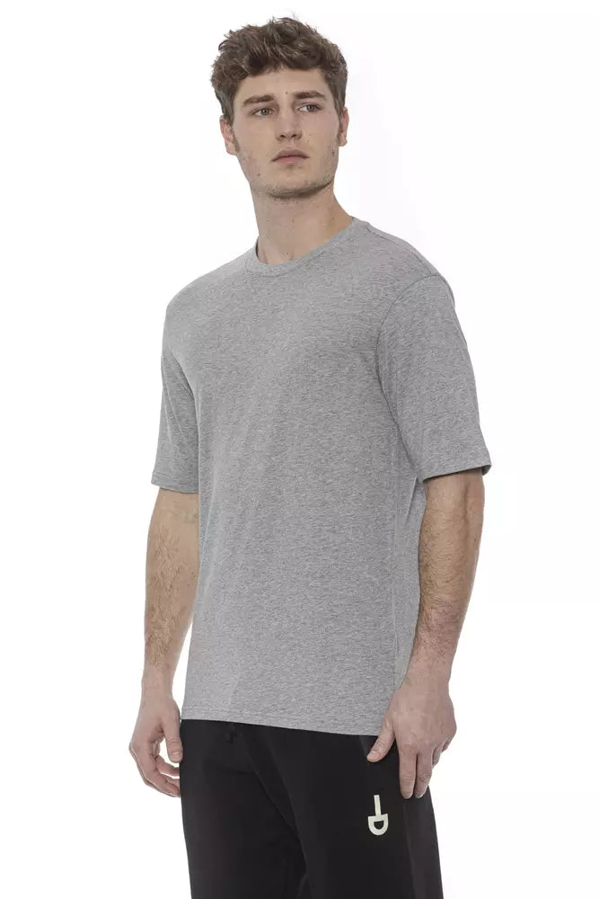 Mannequin wearing gray t-shirt and black pants