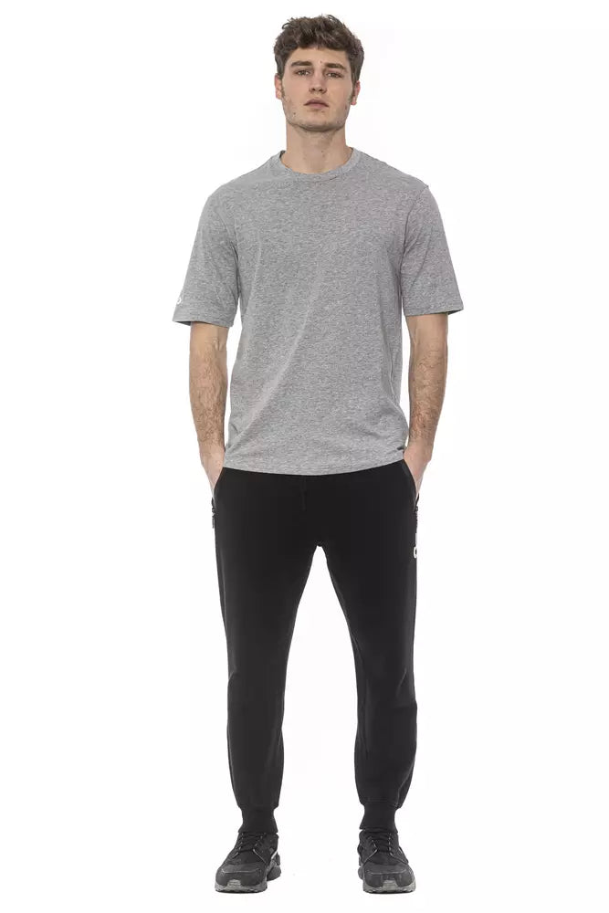 Mannequin wearing gray t-shirt and black pants