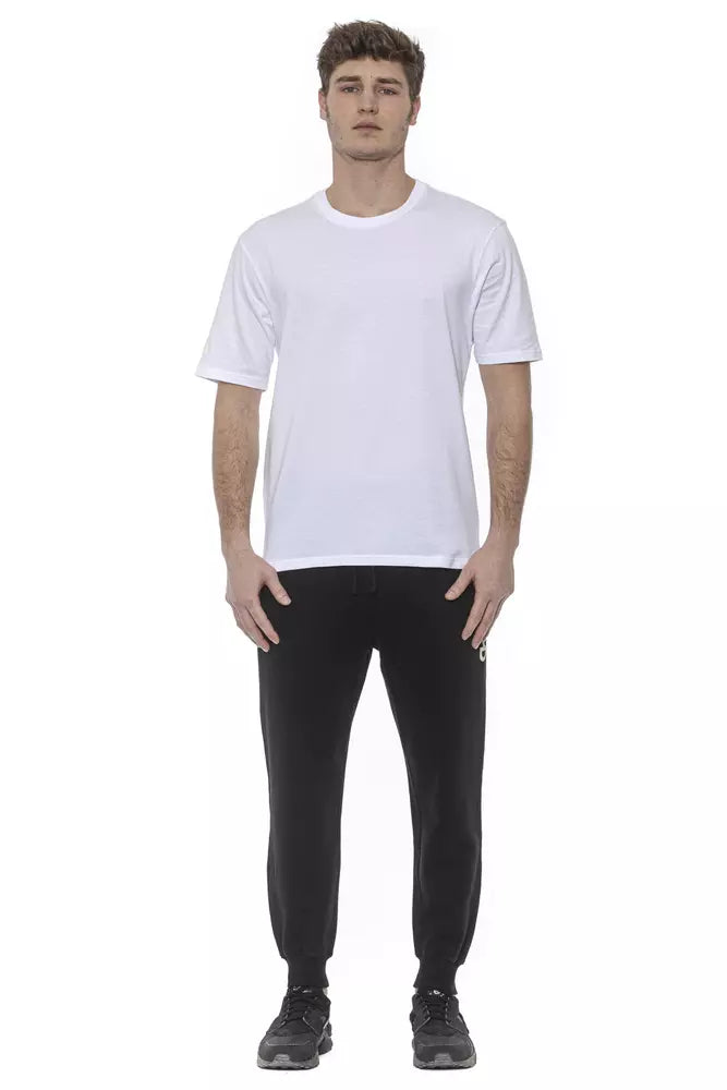 Mannequin wearing white t-shirt and black pants