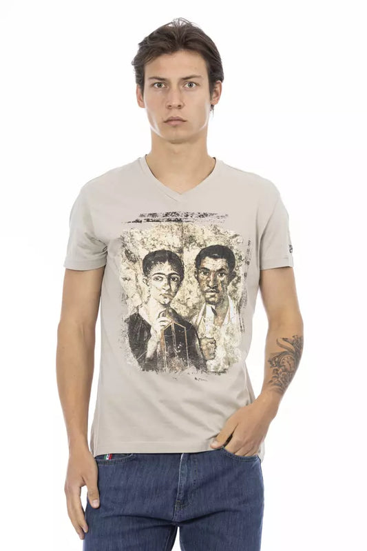 Man wearing graphic t-shirt with two faces on front