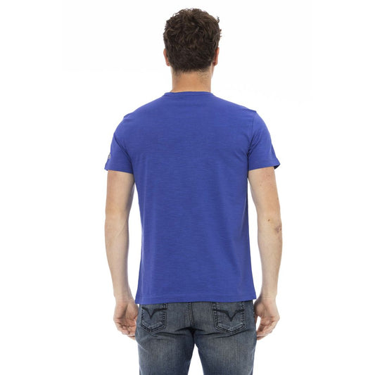 Man wearing blue t-shirt and jeans