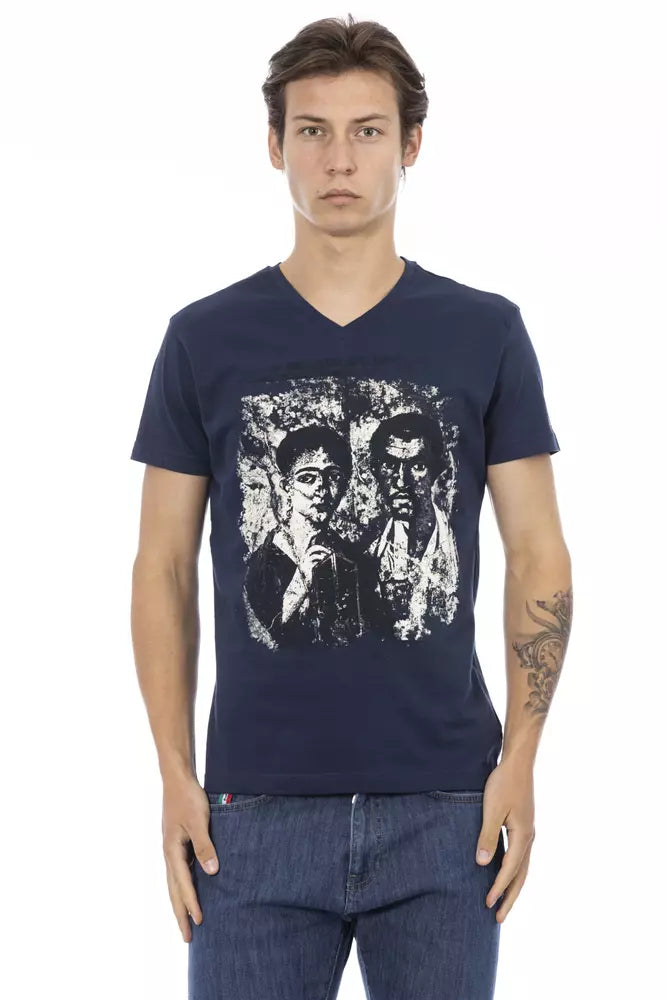 Man wearing blue t-shirt with graphic design on front