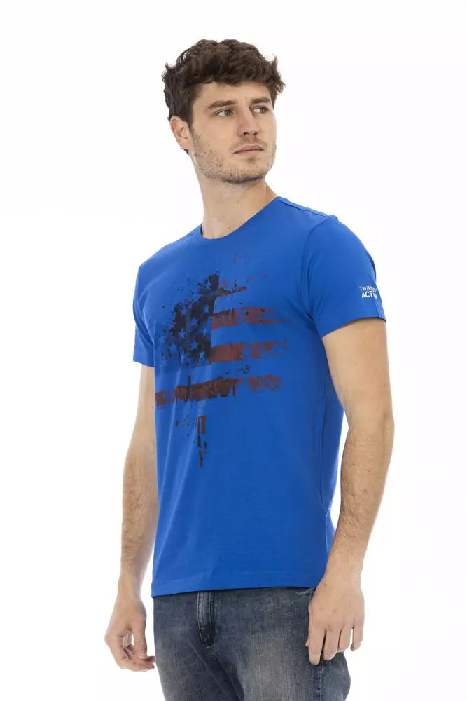 Man wearing blue t-shirt with red design on front