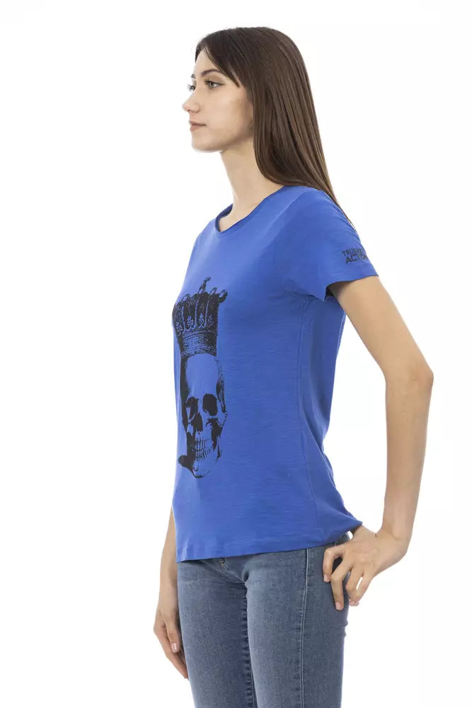 Woman wearing blue t-shirt with graphic design on front