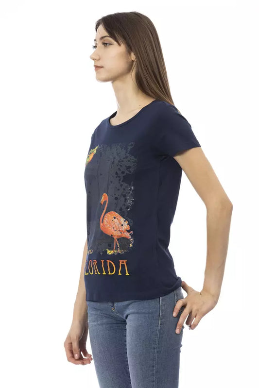 A woman wearing a blue t-shirt with an image of a cartoon character on it