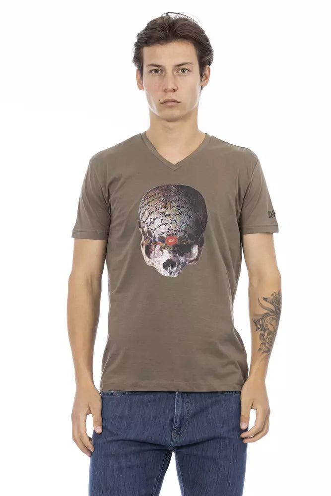 Man wearing a graphic t-shirt with a skull design