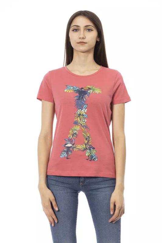 Woman wearing pink t-shirt with colorful graphic design