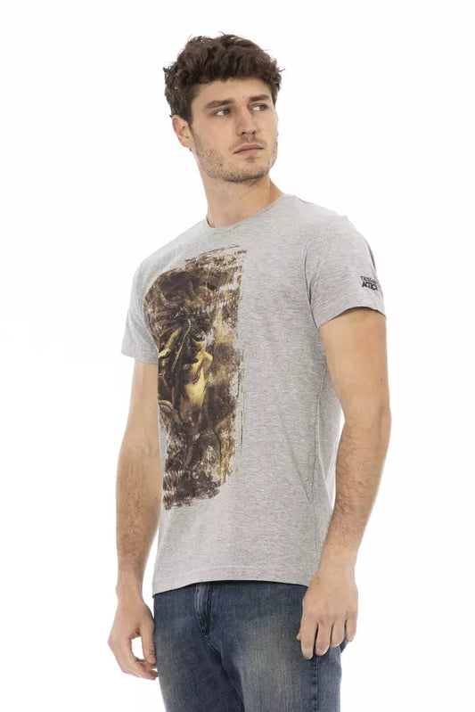 Man wearing gray t-shirt with graphic design on front