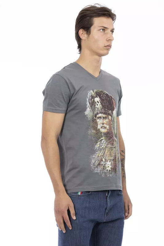 Man wearing gray t-shirt with graphic design on front