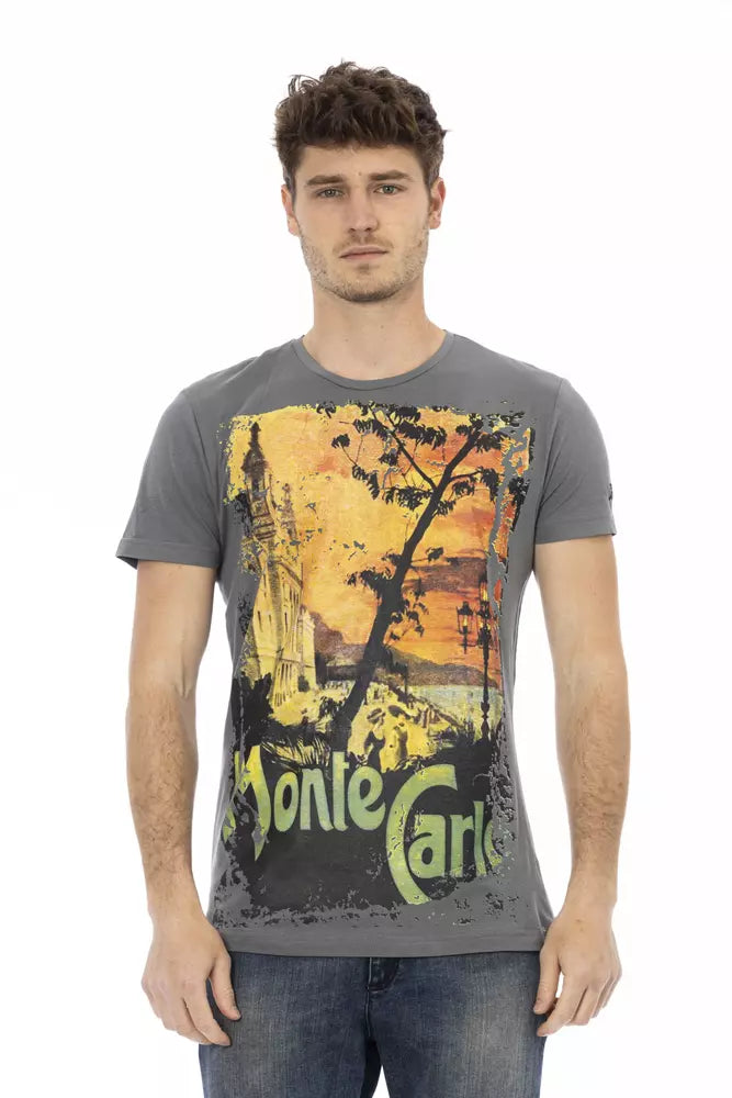 Man wearing graphic t-shirt with trees and sunset