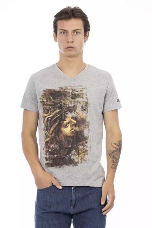 Man wearing gray t-shirt with graphic design on front